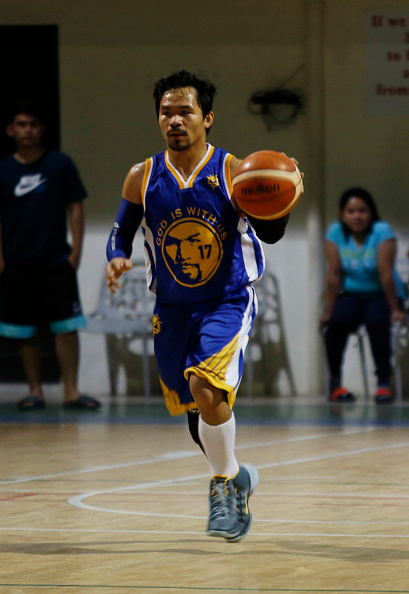 GENERAL SANTOS, PHILIPPINES - JANUARY 28: Manny Pacquiao plays basketball at his residence after a training session on January 28, 2016 in General Santos, Philippines. Pacquiao faces Timothy Bradley in the world welterweight championship bout at the MGM Grand casino on April 9 in Las Vegas, Nevada. (Photo by Jeoffrey Maitem/Getty Images)