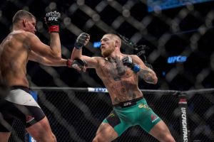 Aug 20, 2016; Las Vegas, NV, USA; Nate Diaz competes against Conor McGregor during UFC 202 at T-Mobile Arena. Mandatory Credit: Joshua Dahl-USA TODAY Sports