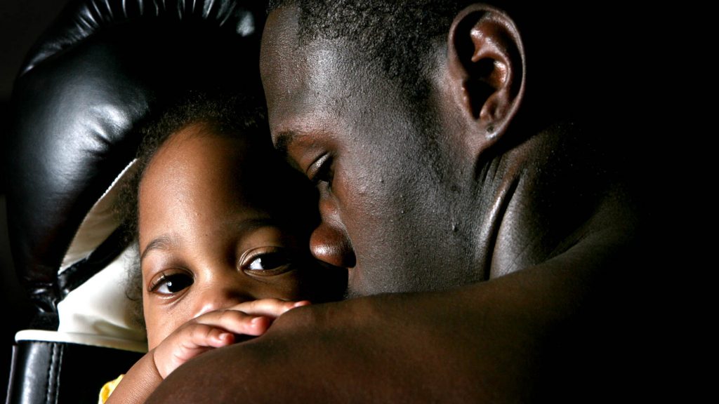 ** FILE ** Boxer Deontay Wilder poses with his daughter Najeya in this April 19, 2007, file photo in Northport, Ala. After only two years of experience in boxing, Wilder will be the United States' entry in the heavyweight category at the Beijing Olympics this summer. (AP Photo/Tuscaloosa News, Robert Sutton) ** NO SALES **